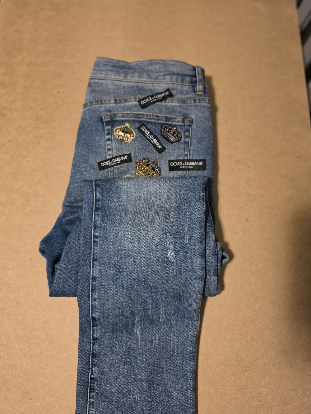 Dolce & Gabbana Blue Denim Jeans with Embroidered Crest Patches